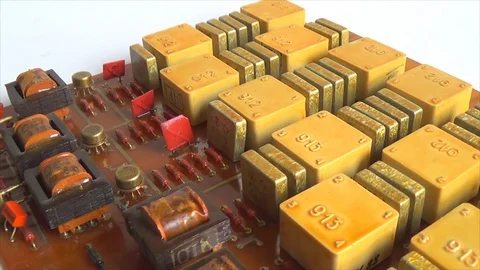 Microchips of the radio components mounted on the board close-up Stock Footage 115500338
