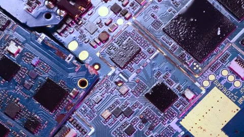 Microchips rotation background in purple neon lights, close-up top view Stock Footage 270457460