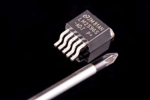 Microcircuit and screwdriver Foto stock