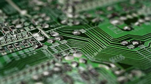 Microcircuit green close up with soft focus, computer modern technologies Stock Photos