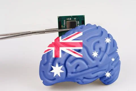 A microcircuit is implanted into the brain with the image of the flag - Aus.. Foto stock