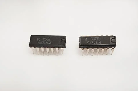 The microcircuit. An old microcircuit on a white background. An electronic .. Foto stock