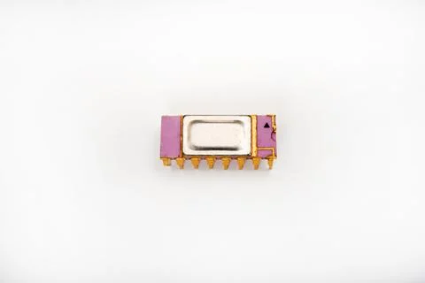 The microcircuit. An old microcircuit on a white background. An electronic .. Foto stock