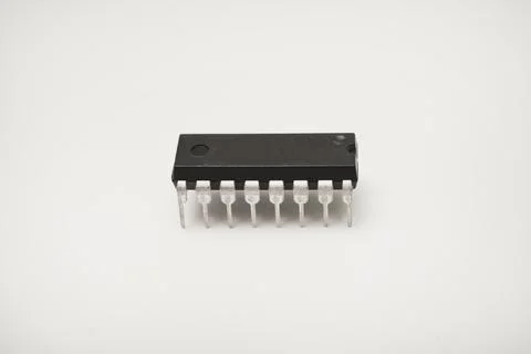 A microcircuit on a white background. A computer chip. A component of semic.. Stock Photos