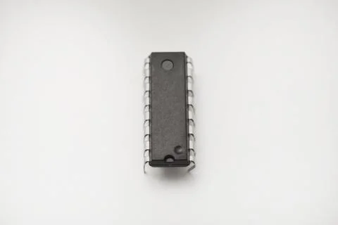 A microcircuit on a white background. A computer chip. A component of semic.. Stock Photos
