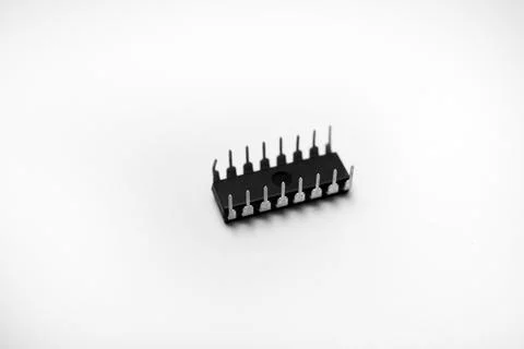 A microcircuit on a white background. A computer chip. A component of semic.. Stock Photos