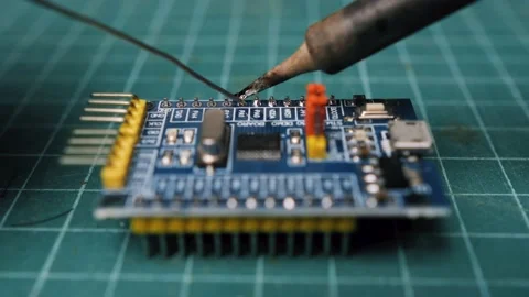 Microcontroller soldering pin-header 03 | Stock Video | Pond5