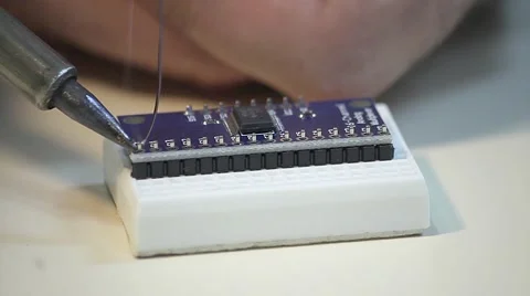 Microcontroller soldering process Stock Footage 59776908