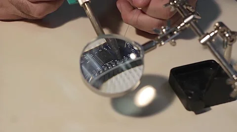 Microcontroller soldering process Stock Footage 59777461