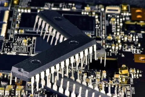 Microcontrollers in plastic cases DIP28 are very slightly inferior in size to Stock Photos