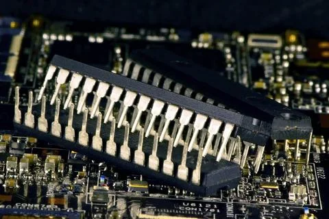 Microcontrollers in plastic cases DIP28 are very slightly inferior in size to Stock Photos