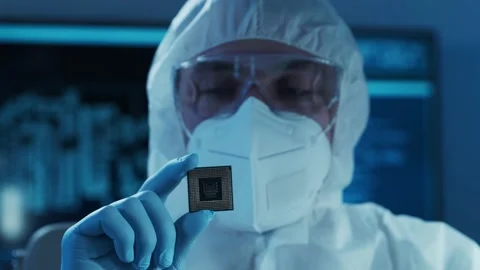 Microelectronics engineer works in a modern scientific laboratory on computing Stock Footage 149387358