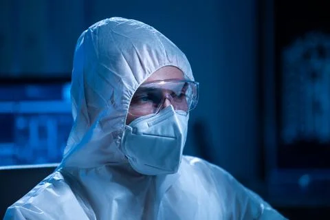 Microelectronics engineer works in a modern scientific laboratory on computing 写真素材