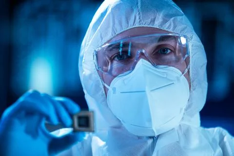 Microelectronics engineer works in a modern scientific laboratory on computing 스톡 사진