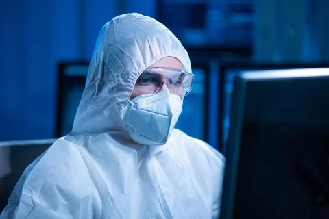 Microelectronics engineer works in a modern scientific laboratory on computing 스톡 사진