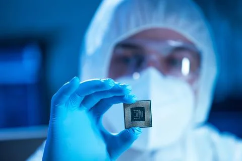 Microelectronics engineer works in a modern scientific laboratory on computing 스톡 사진