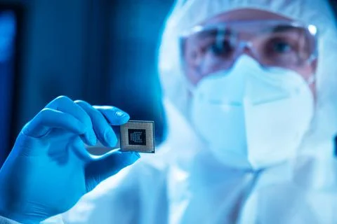 Microelectronics engineer works in a modern scientific laboratory on computing 스톡 사진