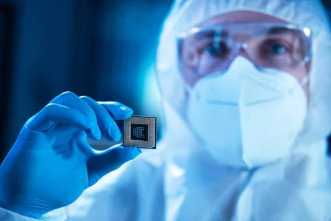 Microelectronics engineer works in a modern scientific laboratory on computing 写真素材