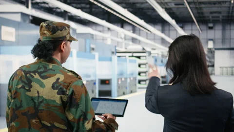 Microelectronics production factory manager and soldier brainstorm Stock Footage 333393521
