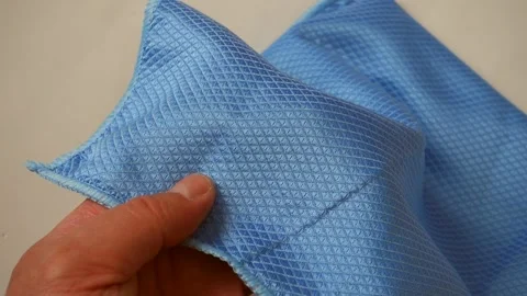 Microfiber cleaning cloth on a white background,close-up microfiber cleaning  動画素材 172078589