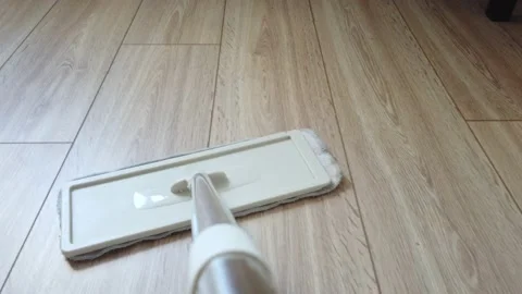 Microfiber Dust Wet Mop move around the floor close-up 4K. Top view POV of mop Stock Footage 132877950