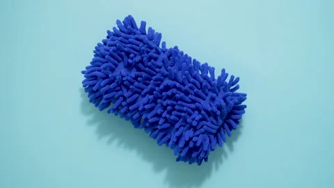 Microfiber mop tip for cleaning and mopping isolated on blue background Stock Footage 205883929