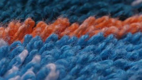 Microfiber texture with soft big pile. Side view texture of orange and blue Stock Footage 127855130
