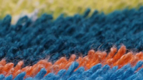 Microfiber texture with soft big pile. Side view texture of orange and blue Stock Footage 127855338