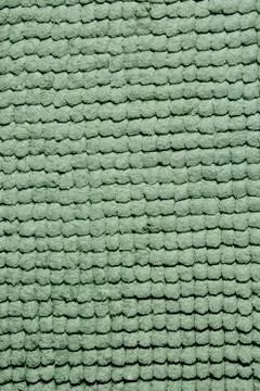 Microfiber texture with a soft large pile. Top view texture of light green big Stock Photos