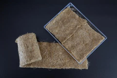 Microgreen sowing mats on a black background. Stock Photos
