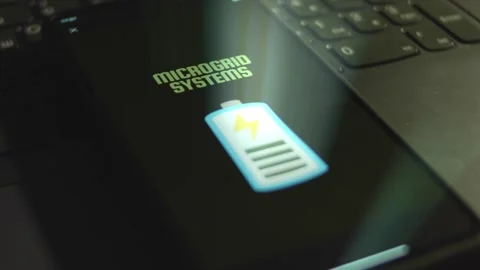 Microgrid Systems inscription on smartphone screen. Graphic presentation of Stock Footage 271126096
