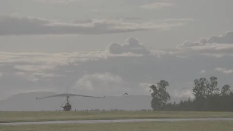 Microlight preparing for take off and in flight Stock Footage 147513925