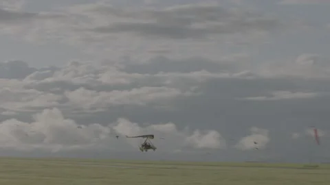 Microlight preparing for take off and in flight Stock Footage 147514679