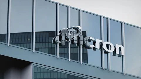 Micron Technology Stock data presented on the logo of the office facade Stock Photos