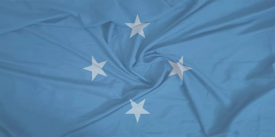 Micronesia Flag fabric rippling in the wind Stock Photos
