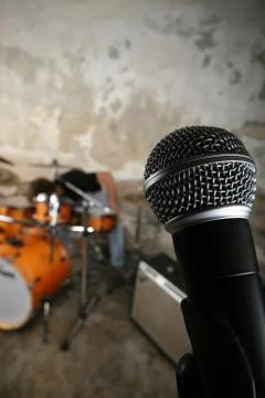 Microphone and drumset on stage Stock Photos