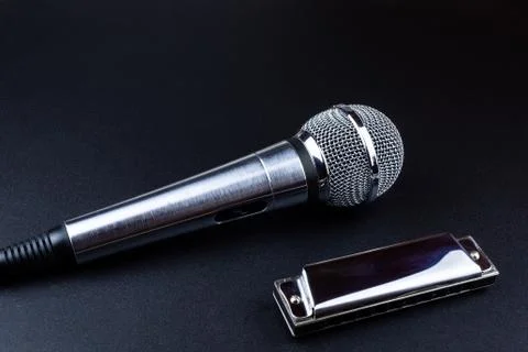 Microphone and harmonica Stock Photos