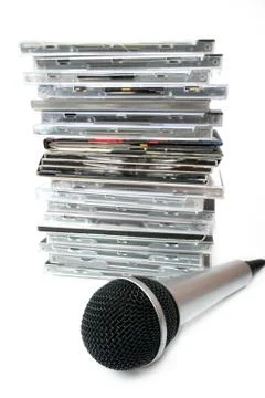 Microphone and karaoke compact discs collection Stock Photos