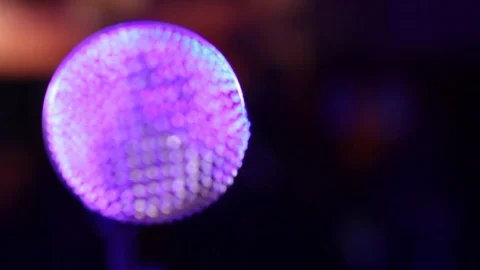MICROPHONE IN AND OUT OF FOCUS Stock Footage 75999492
