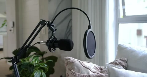 Microphone assembly is shifting and settling after off-screen adjustment to Stock Footage 335070750