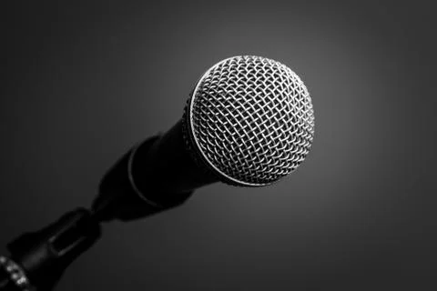 Microphone on black background, close-up Stock Photos
