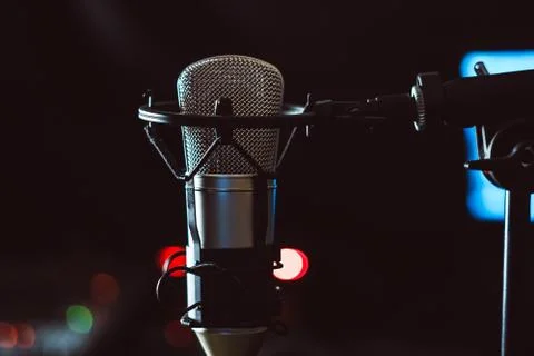 Microphone on black background Photos