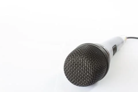 Microphone with black wire isolated on white Stock Photos