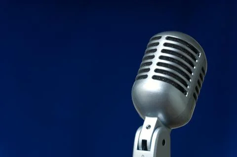 Microphone on blue Stock Photos