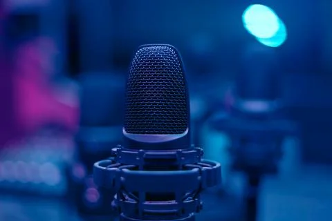 Microphone in blue room Stock Photos