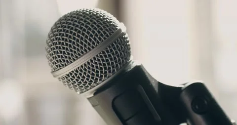 Microphone close-up, mic isolated on daylight background. Karaoke singing Stock Footage 237523862