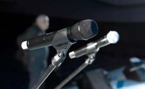 Microphone close-up on stage Stock Photos