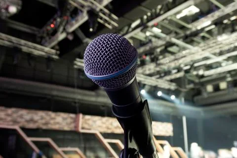 Microphone close-up on stage Stock Photos
