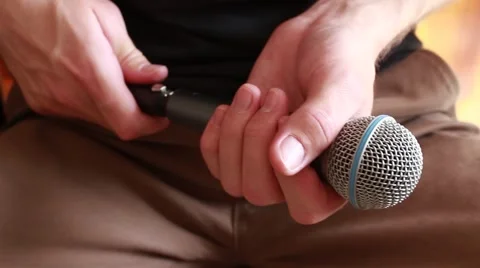 Microphone connecting Stock Footage 61694505