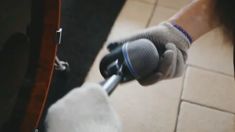 Microphone оn drums at a concert. microphone preparation Stock Footage 104243304